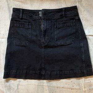 Black denim mini skirt